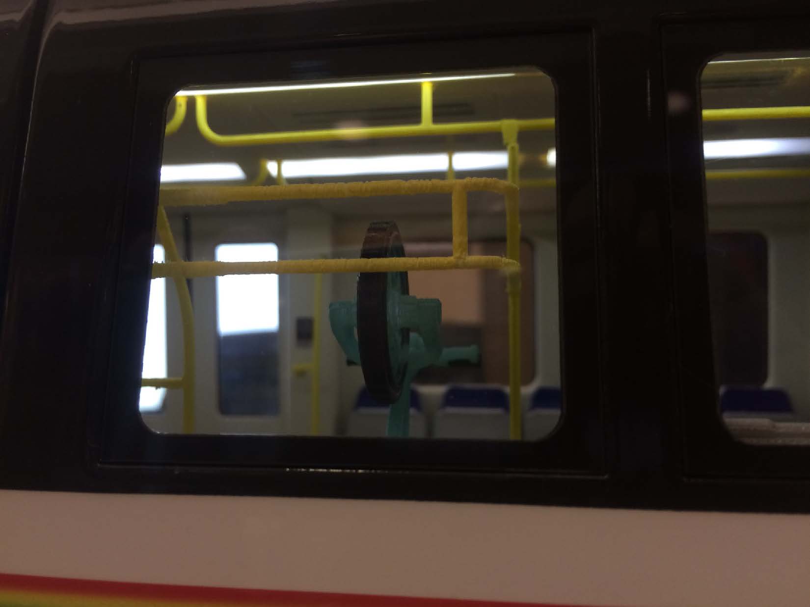 Image of bike hooks from to scale train model.