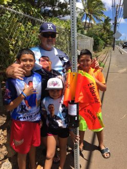 Eddie Werner's son Kaulana was killed while walking on Farrington Highway on April 24, 2016. Eddie and his grandchildren installed pedestrian flags in July, 2016.